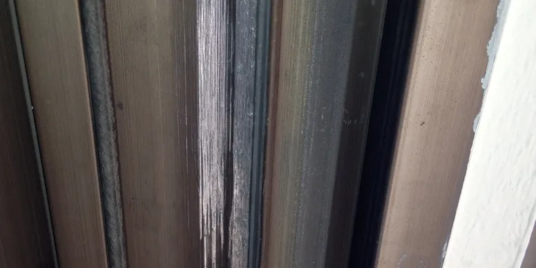 A blurry image of the outside of a building.